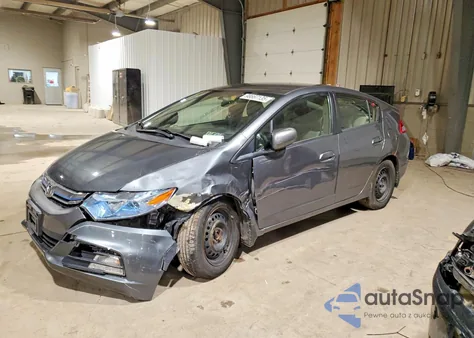 2014 Honda Insight z USA, uszkodzony, nr VIN JHMZE2H30ES001064